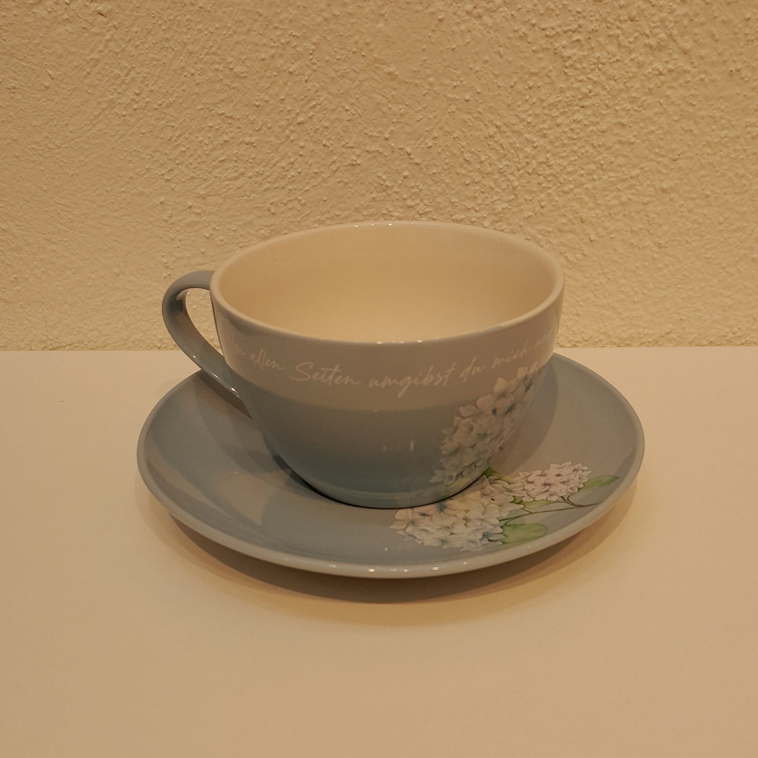 Tasse / Untertasse "Von allen Seiten"