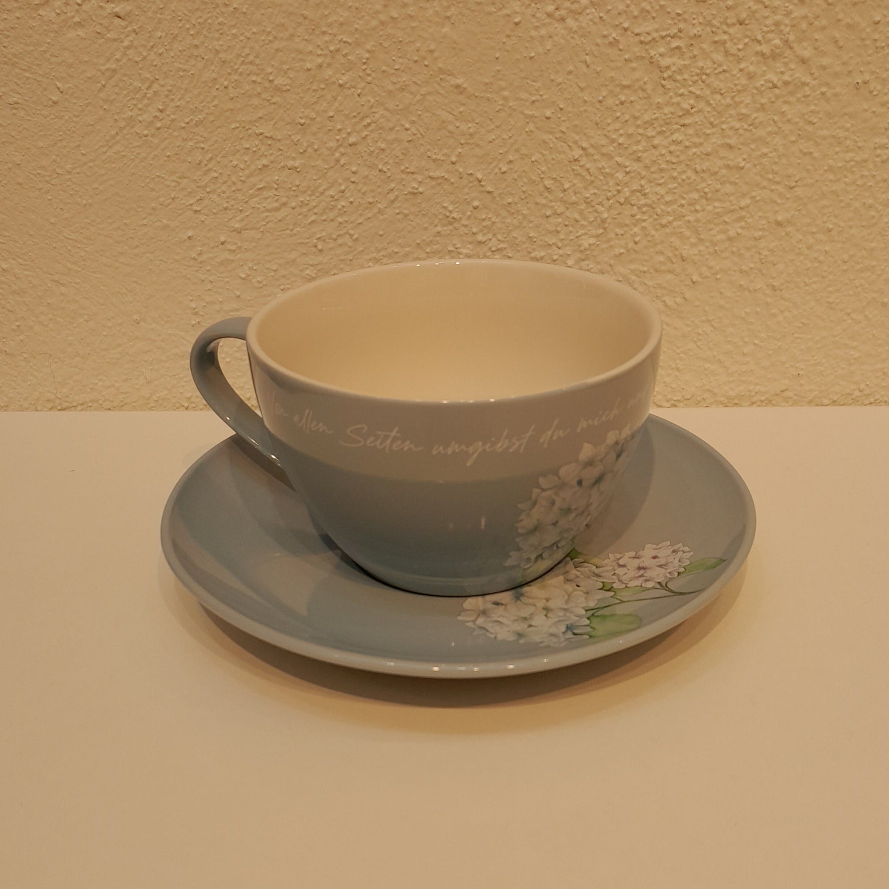 Tasse / Untertasse "Von allen Seiten"