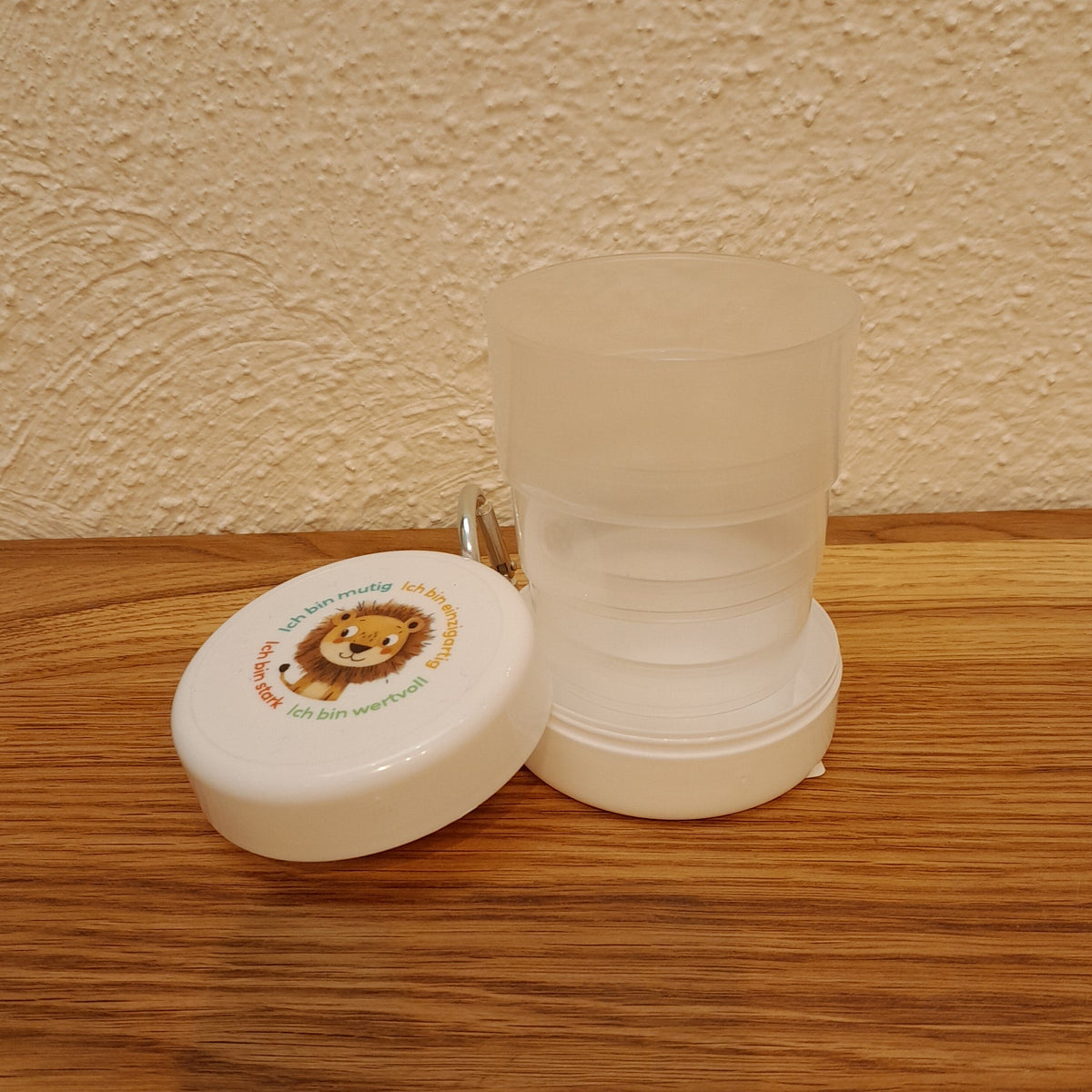 Trinkbecher Löwe, faltbar mit Karabiner
