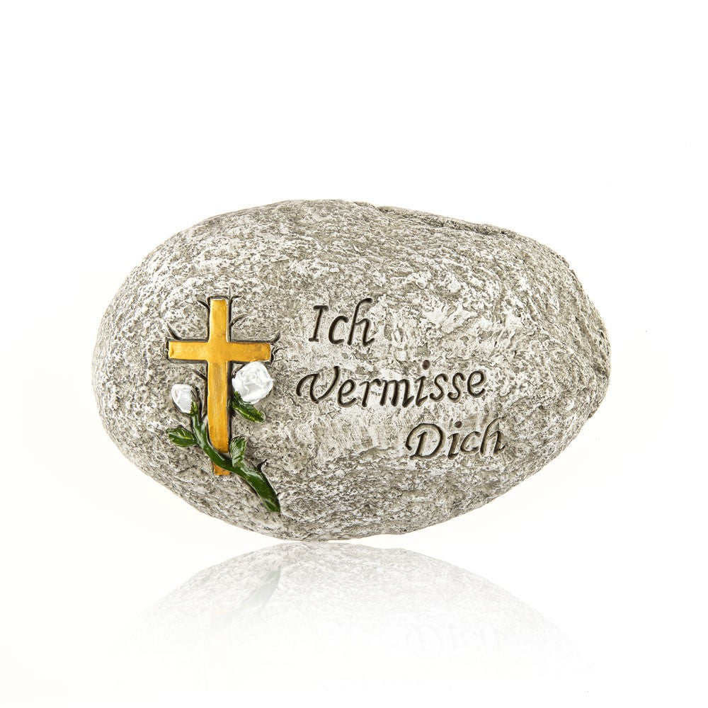 Stein mit Inschrift "Ich vermisse dich"